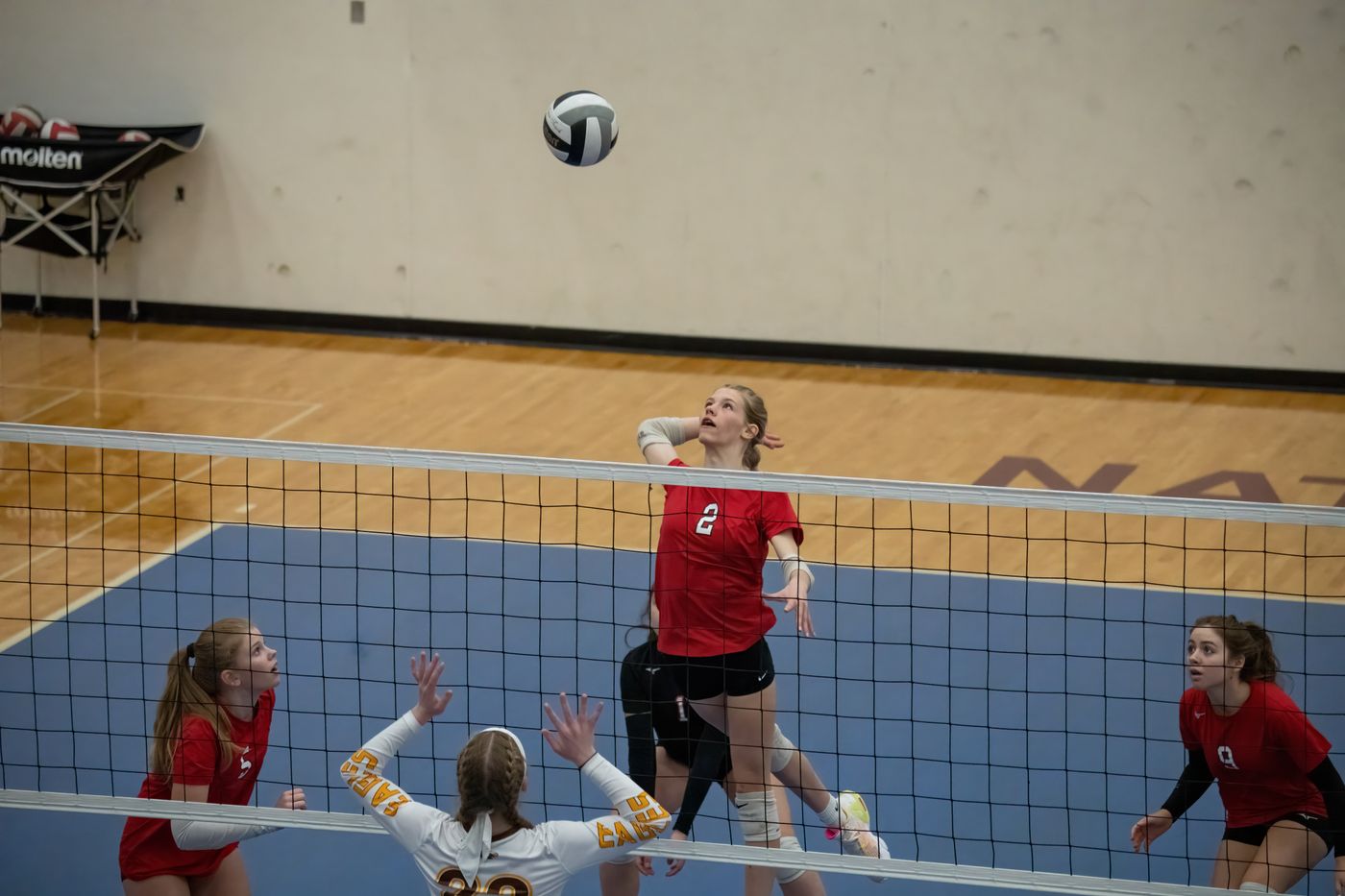 A girls volleyball match in a school gym in Rochester, Minnesota.